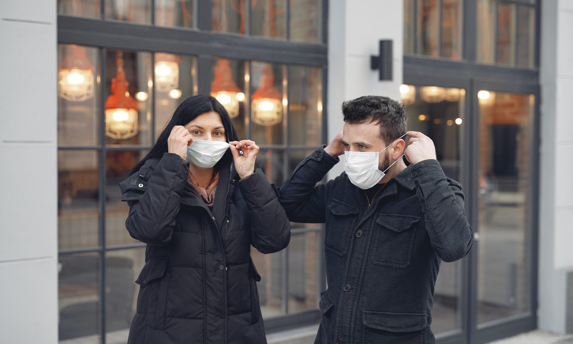 1 woman and 2 man wearing protective face masks