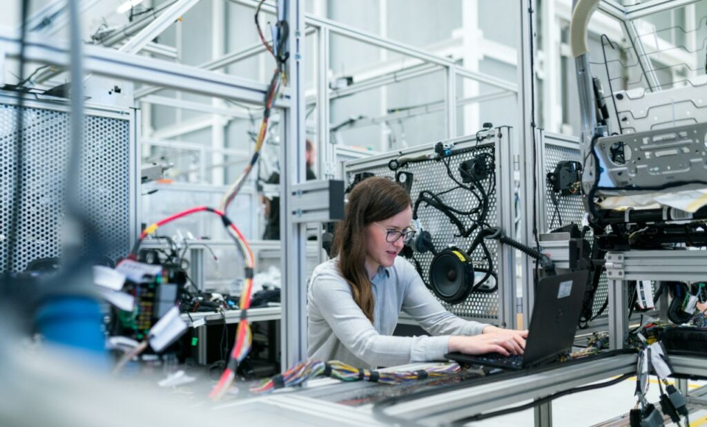 Woman working robotics