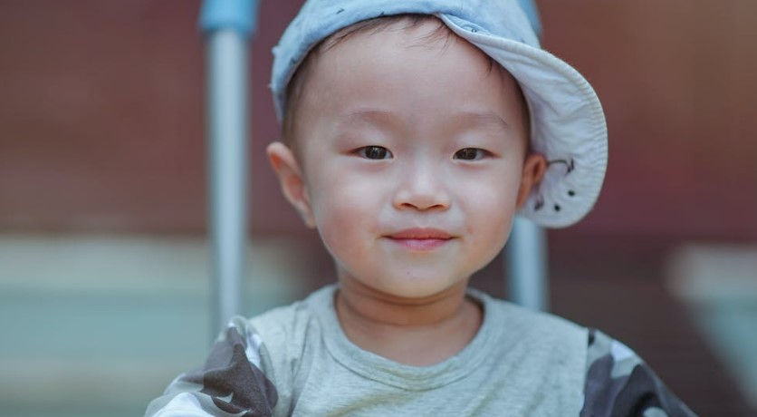 Asian boy smiling