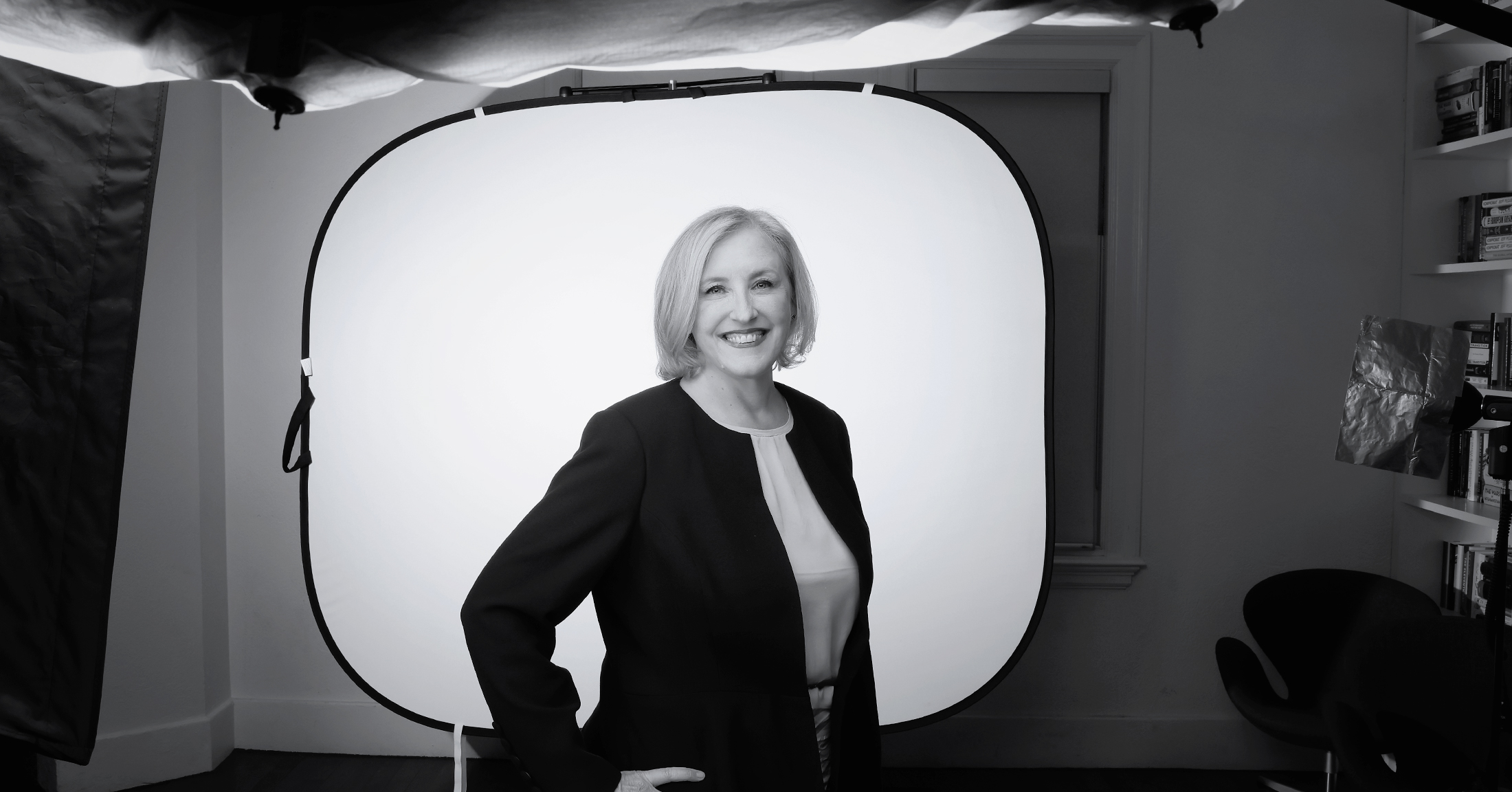 Lisa Raitt stands in front of photography equipment